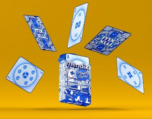 Mendix playing cards box with blue patterned cards floating on a yellow background